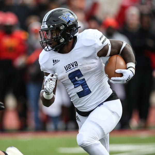 Running back Tariq Reid carries the ball in a game against Ferris State